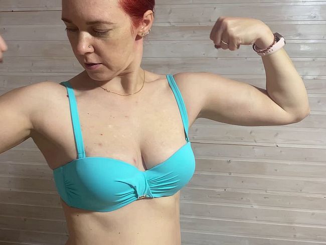 Very strong milf showing and flexing her big muscle. Also showing her tits